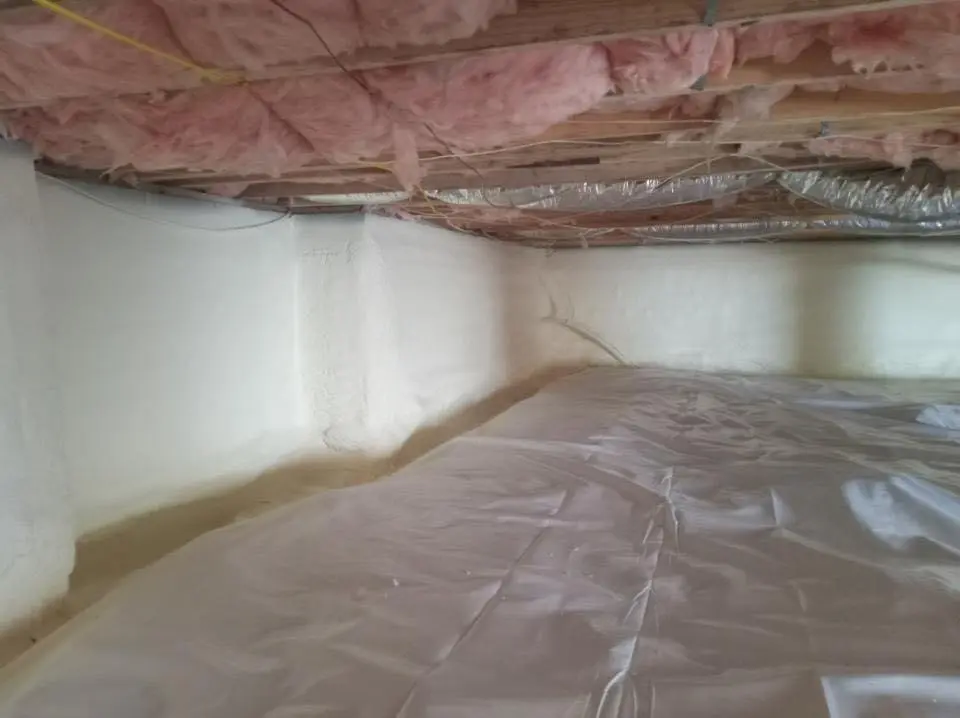 Crawl space encapsulation with closed-cell spray foam for Commercial Roof Restoration in Mills River